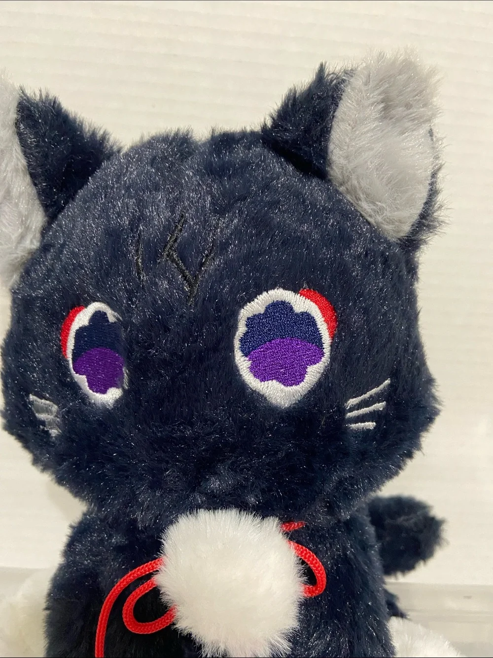 Plush Black & White Cat